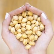 Chickpeas in woman hands